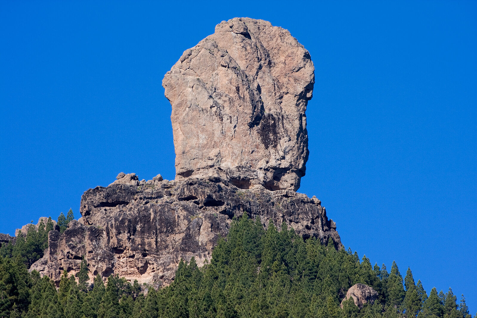 This file is licensed under the Creative Commons Attribution-Share Alike 2.0 Generic license. Roque Nublo, viewed from La Culata (Tejeda), on Gran Canaria in the Canary Islands, Spain. by El Coleccionista de Instantes at https://flickr.com/photos/31195974@N05/4628865788
